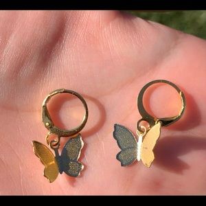 Gold butterfly huggie earrings